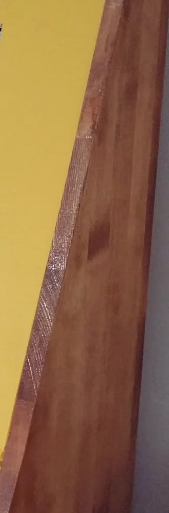 Sides in warm-toned treated pine.